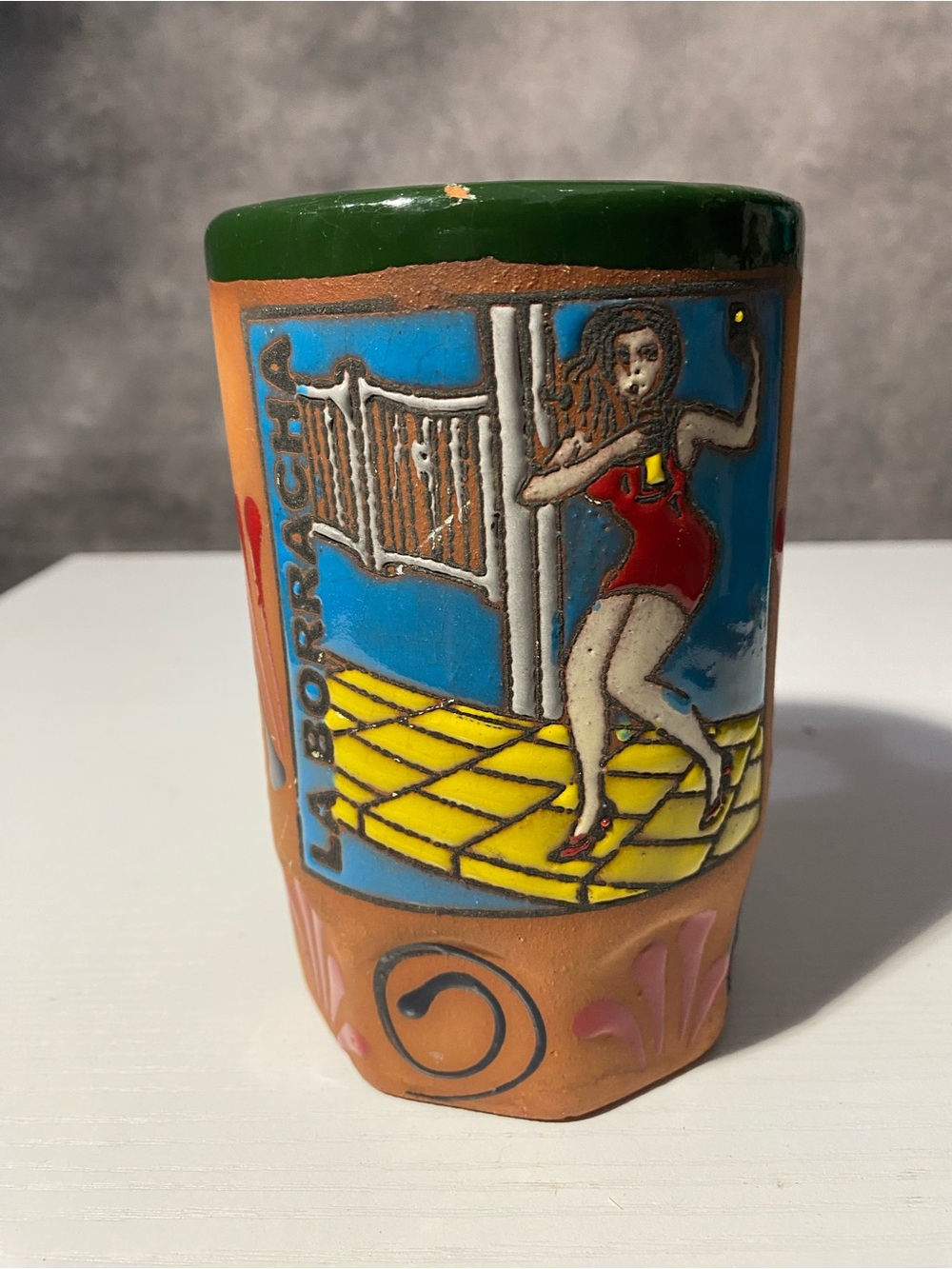 Hand-Painted Ceramic Tumbler with Green Rim and Multicolor Scene